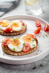 toast with egg and tomato for breakfast
