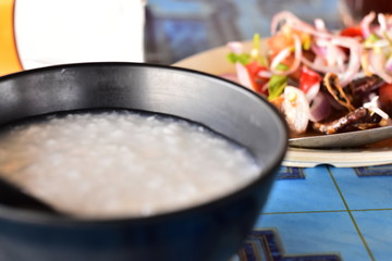 the thai rice porridge with fried dried squid