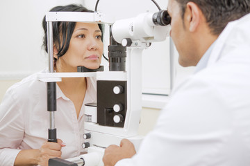 Mature woman having ophthalmological examination