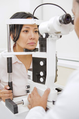 Mature woman having ophthalmological examination