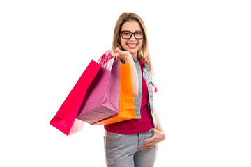 Smiling woman with shopping bags