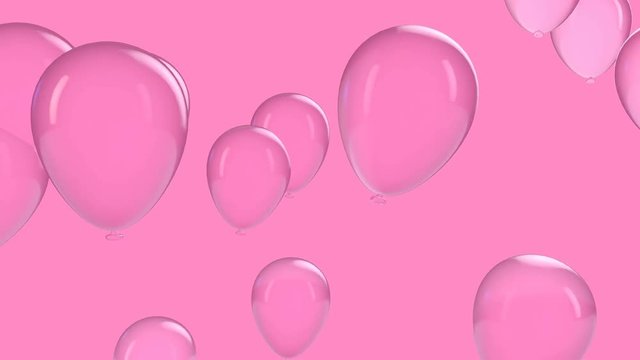 Pink balloon floating in the air