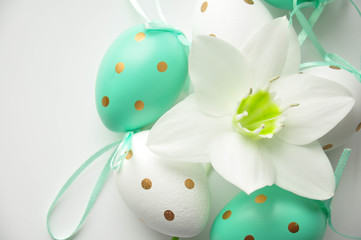 Delicate flower with ticles on a pure white background. Blooming lily bud. Royal flower Background for the site. Flower shop. Easter holiday eggs