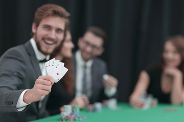 player to the casino with a combination of four aces.