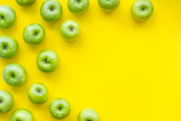 green apples for organic summer food pattern on yellow background top view mockup