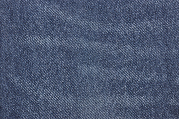 Fototapeta na wymiar jeans texture. background of blue jeans for design. Copy space.