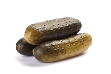 Three pickled cucumbers isolated on white background. Salting concept.