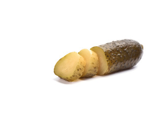 Pickled cucumber cut into slices isolated on a white background. Salting concept.