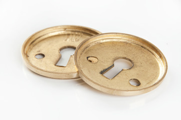 Vintage brass keyhole lock covers