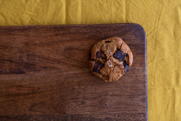 Fototapeta na wymiar paleo chocolate chunk tahini cookie. salty cookie.