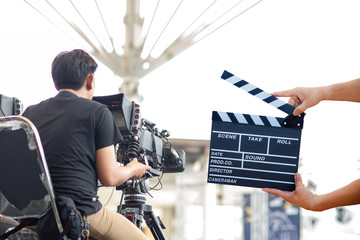 Man hands holding movie clapper.Film director concept.camera show viewfinder image catch motion in...