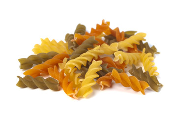 Colored italian pasta isolated on white background