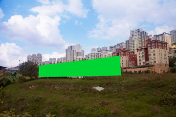 Fototapeta na wymiar Empty green advertising billboard-green box