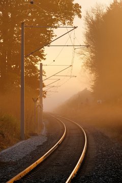 Railway tracks in the fog, sunrise, Tutzing, Funfseenland, Upper Bavaria, Bavaria, Germany, Europe