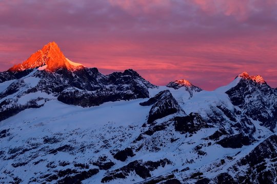 Zinalrothorn with snow in red dawn glow, Gornergrat, Zermatt, Canton of Valais, Switzerland, Europe