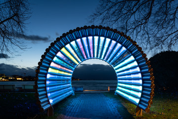 Illuminated structure on the Molo in Bregenz after sunset