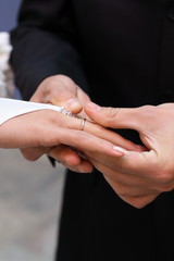 Obraz na płótnie Canvas Beautiful closeup of golden wedding ring hand. Wedding ring. Happy couple. Beautiful bride. Valentine gift.