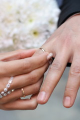 Beautiful closeup of golden wedding ring hand. Wedding ring. Happy couple.  Beautiful bride. Valentine gift.
