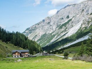 Fototapeta na wymiar Mountain landscape with farm restaurant, the Pinnistal valley branches off from the Stubai valley, Stubai Alps, Tyrol, Austria, Europe