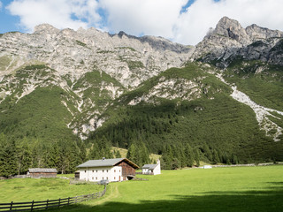 Alpine dairy farm  in a mountain landscape in the Pinnistal,  a valley that  branches off from the Stubai valley, Stubai Alps, Tyrol, Austria, Europe