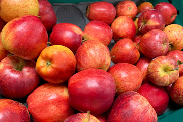 A pile of red apples as background, texture (Gala)