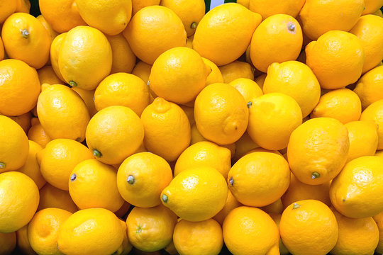 A pile of lemons as a background (texture)