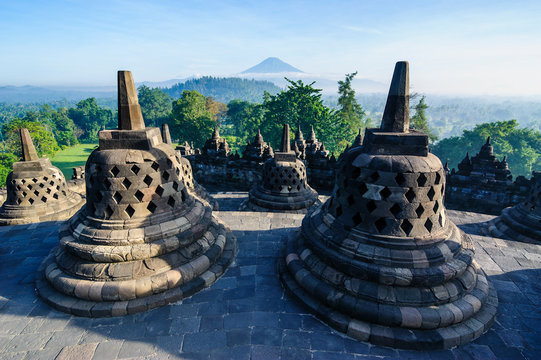 Indonesia, Java, Borobudur Temple Complex, stupas in early morning light