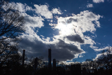Blue sky with clouds and  New York skyline 