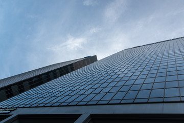 Modern glass building seen from below