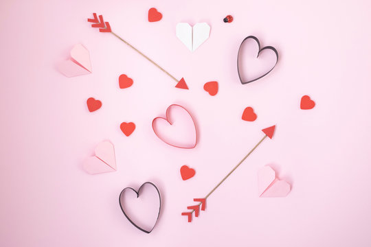 Valentines symbols on pink background