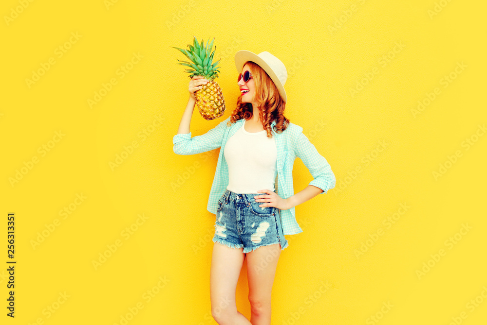 Sticker portrait happy smiling woman holding pineapple having fun in summer straw hat, sunglasses, shorts on