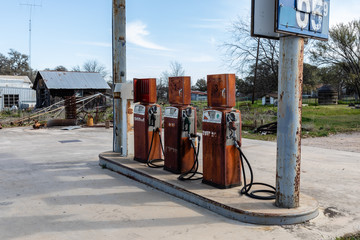 Fototapeta na wymiar old rusty gas pumps