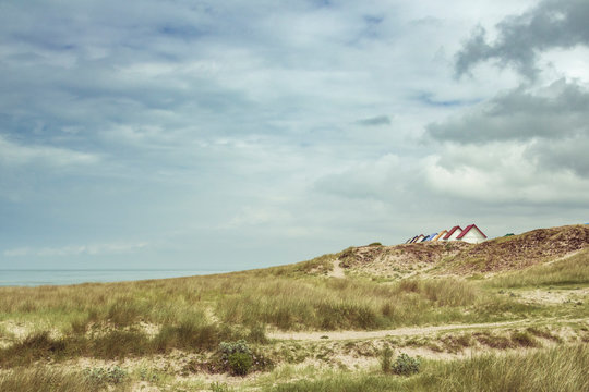 France, Upper Normandy, dunes and bathhouses near Gouville