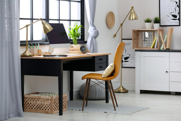Modern home workplace with wooden crates. Eco style interior