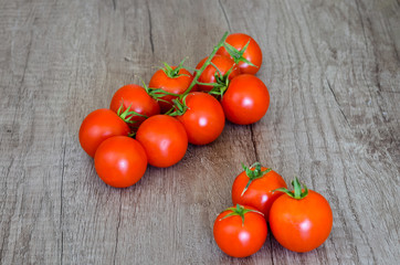 Close up overhead  cherry tomatoes  clusters on table.