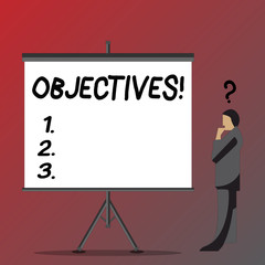 Text sign showing Objectives. Business photo showcasing Goals planned to be achieved Desired targets Company missions Businessman with Question Mark Above his Head Standing Beside Blank Screen