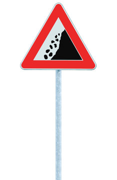 Falling rocks risk caution road sign on pole post, large detailed isolated vertical roadside stones traffic warning signage macro closeup, rock slide fall danger possible ahead, red frame triangle