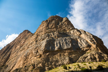 Mountains and the nature of the North Caucasus, the blue sky over high rocks in the beautiful gorge