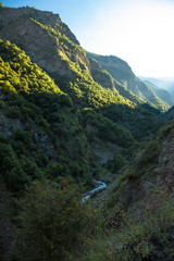 The mountain river in the beautiful gorge. The wild nature in mountains of the North Caucasus