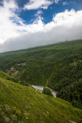 Mountains of the North Caucasus, mountain tops in clouds. Wild nature