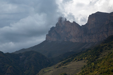 Mountains of the North Caucasus, mountain tops in clouds. Wild nature