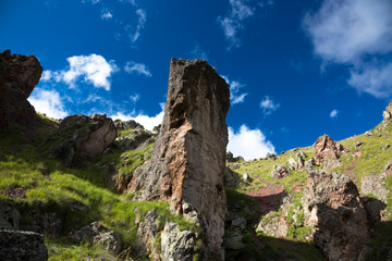 Mountains and the nature of the North Caucasus, the blue sky over high rocks in the beautiful gorge