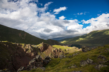 Fototapeta premium Mountains and the nature of the North Caucasus, the blue sky over high rocks in the beautiful gorge