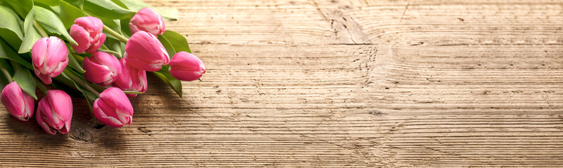 Bunch of tulip flower on wood background