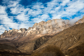 Mountains of the North Caucasus, mountain tops in clouds. Wild nature