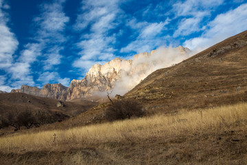 Obraz premium Mountains of the North Caucasus, mountain tops in clouds. Wild nature