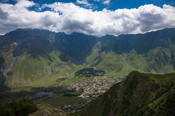 Naklejka premium Mountains of the North Caucasus, mountain tops in clouds. Wild nature