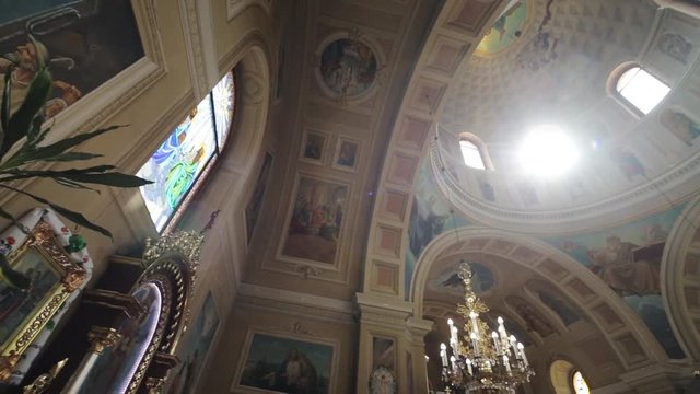 Sun in old catholic church inside altar arch architectural architecture art building cathedral chapel christian christianity historic historical holy religion religious slow motion