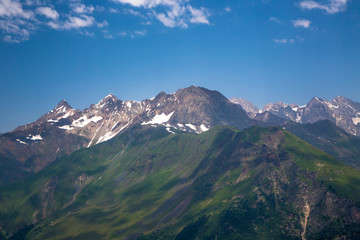 Fototapeta premium Mountains and the nature of the North Caucasus, the blue sky over high rocks in the beautiful gorge