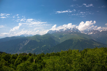 Obraz premium Mountains of the North Caucasus, mountain tops in clouds. Wild nature